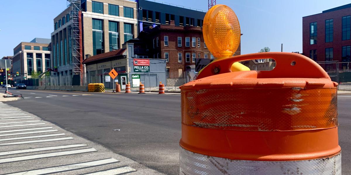 A view of a construction cone on the side of the road.