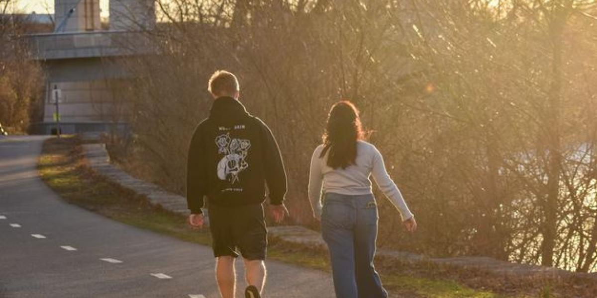 two people walking along olentangy trail